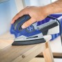 LUX Multischleifer mit Schleifauflage K120 beim Schleifen von Holz.