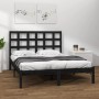 Schwarzes Massivholzbett 200x200 cm mit Lattenrost und Kopfteil.