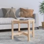 Runder Couchtisch aus hellem Massivholz Kiefer, Ø 62,5 cm, mit stabiler Konstruktion im Wohnzimmer.