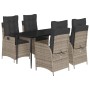 5-tlg. Garten-Essgruppe aus grauem Rattan mit schwarzen Kissen und Tisch mit Glasplatte.
