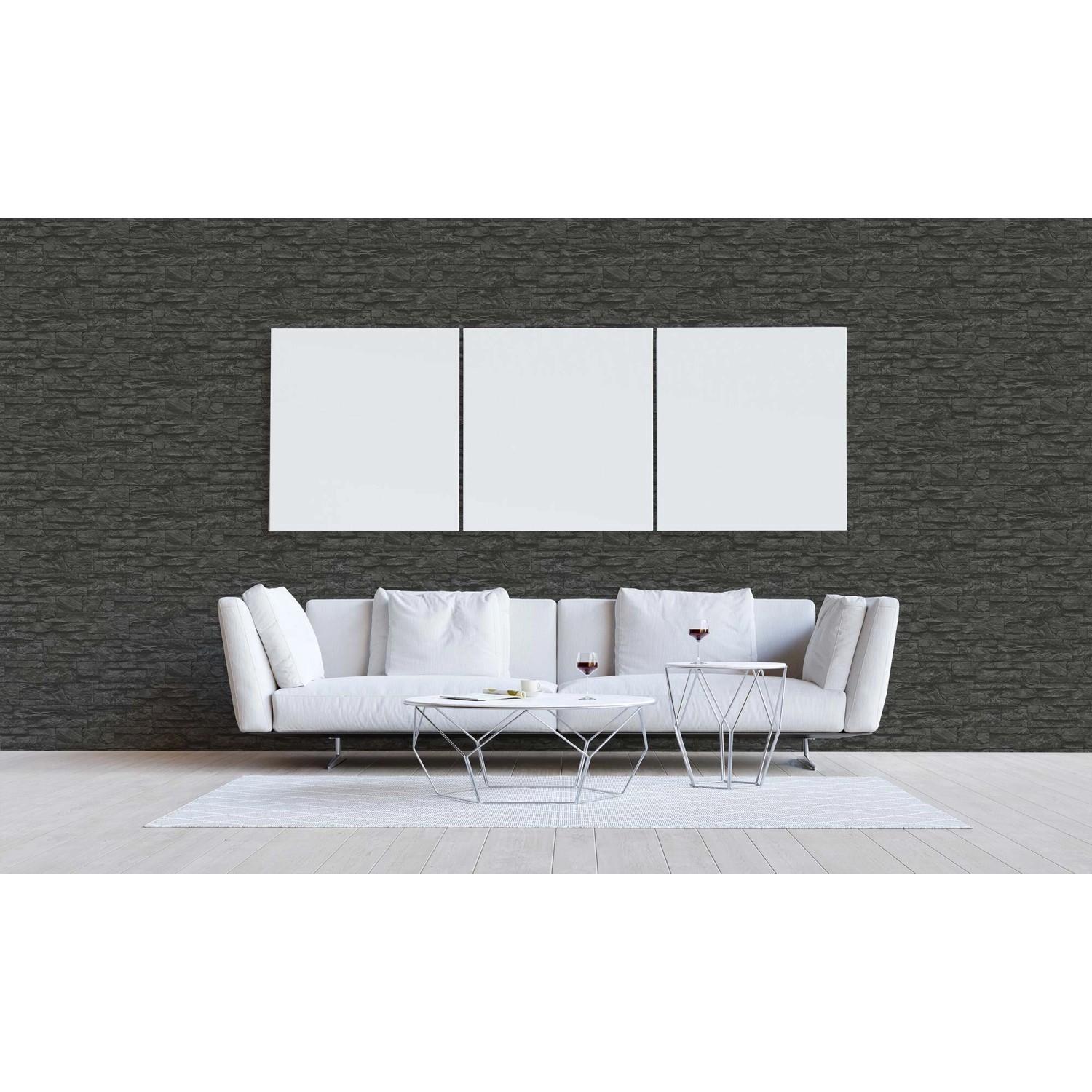 Grau-schwarze Vliestapete in Steinoptik "Vicco" von Tadessi im Wohnraum.