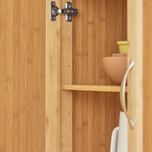 Detailaufnahme: Innenraum des SoBuy Küchenwagens aus Bambus mit Einlegeboden und Geschirr.