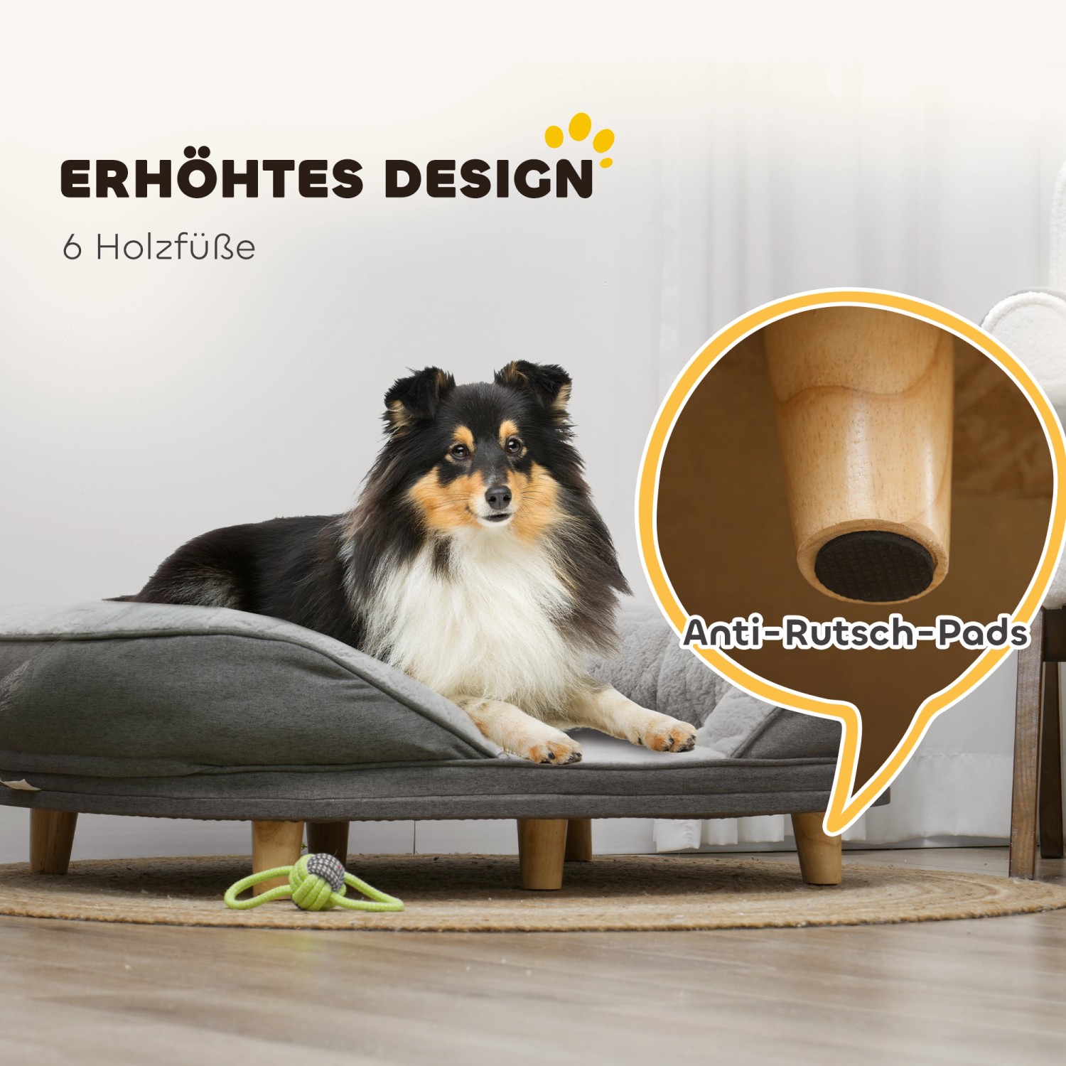 Graues PawHut Hundesofa mit Hund, erhöht mit Holzfüßen und Anti-Rutsch Pads.