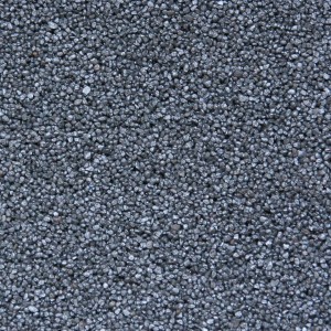 Nahaufnahme: Terralith Buntsteinputz Mosaikputz, 2mm, Grau Anthrazit. Strukturierter Wandputz.