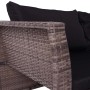 Detailaufnahme: Graue Poly-Rattan Lounge-Garnitur mit schwarzen Kissen.