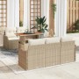 6-teiliges Garten-Sofa-Set aus Poly Rattan in Beige mit Tisch und Kissen.