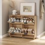 SoBuy Schuhschrank FSR214-N aus Holz mit 4 Klappen und Schuhen im Flur.