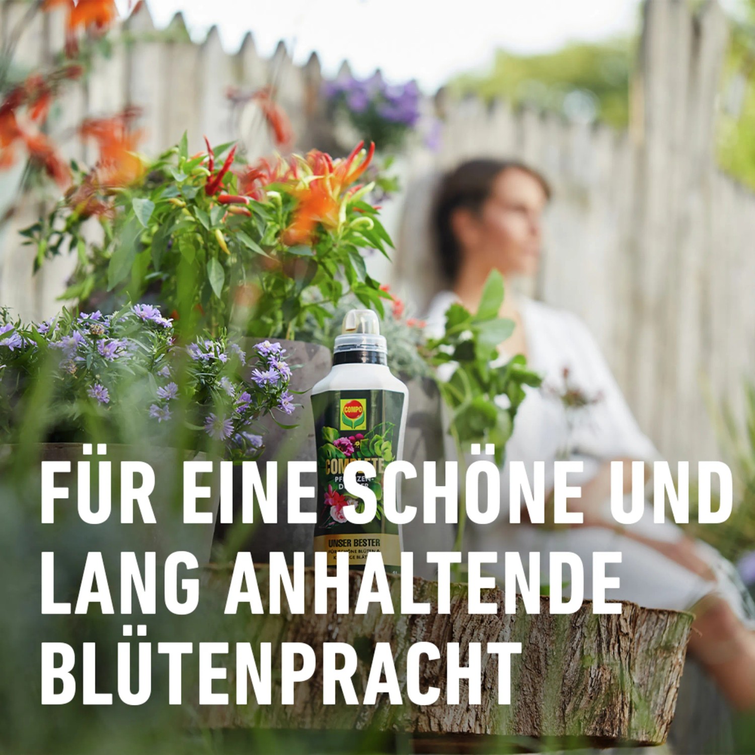 Compo Complete Pflanzendünger 1 l Flasche für üppige Blütenpracht im Garten.