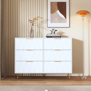 Weißer PXloue Schubladenschrank mit 6 Schubladen und goldenen Füßen im Wohnzimmer.
