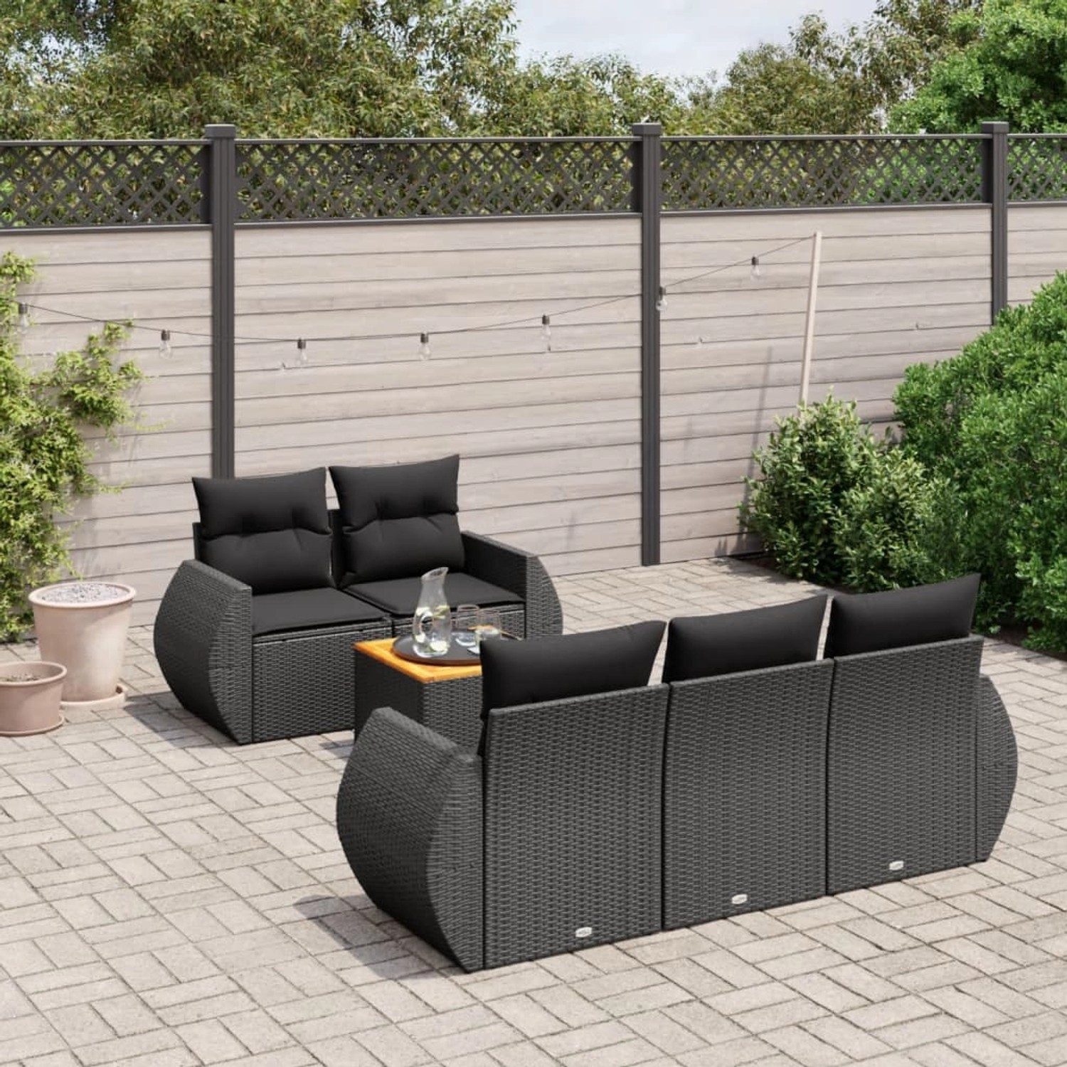 Schwarze 6-tlg. vidaXL Garten-Sofagarnitur aus Poly Rattan mit Kissen.