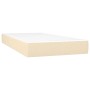 Cremefarbenes Boxspringbett 80x200 cm mit Matratze und Stoffbezug.