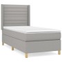 Hellgraues vidaXL Boxspringbett 90x190 cm mit Matratze und Kopfteil.