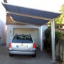 Ximax Alu Carport Linea im Edelstahl-Look mit Auto. Einzelcarport mit transparentem Dach.