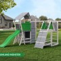 Spielturm Funky Combo DREAMLAND MONSTER mit Rutsche, Kletterwand und Schaukel im Garten.