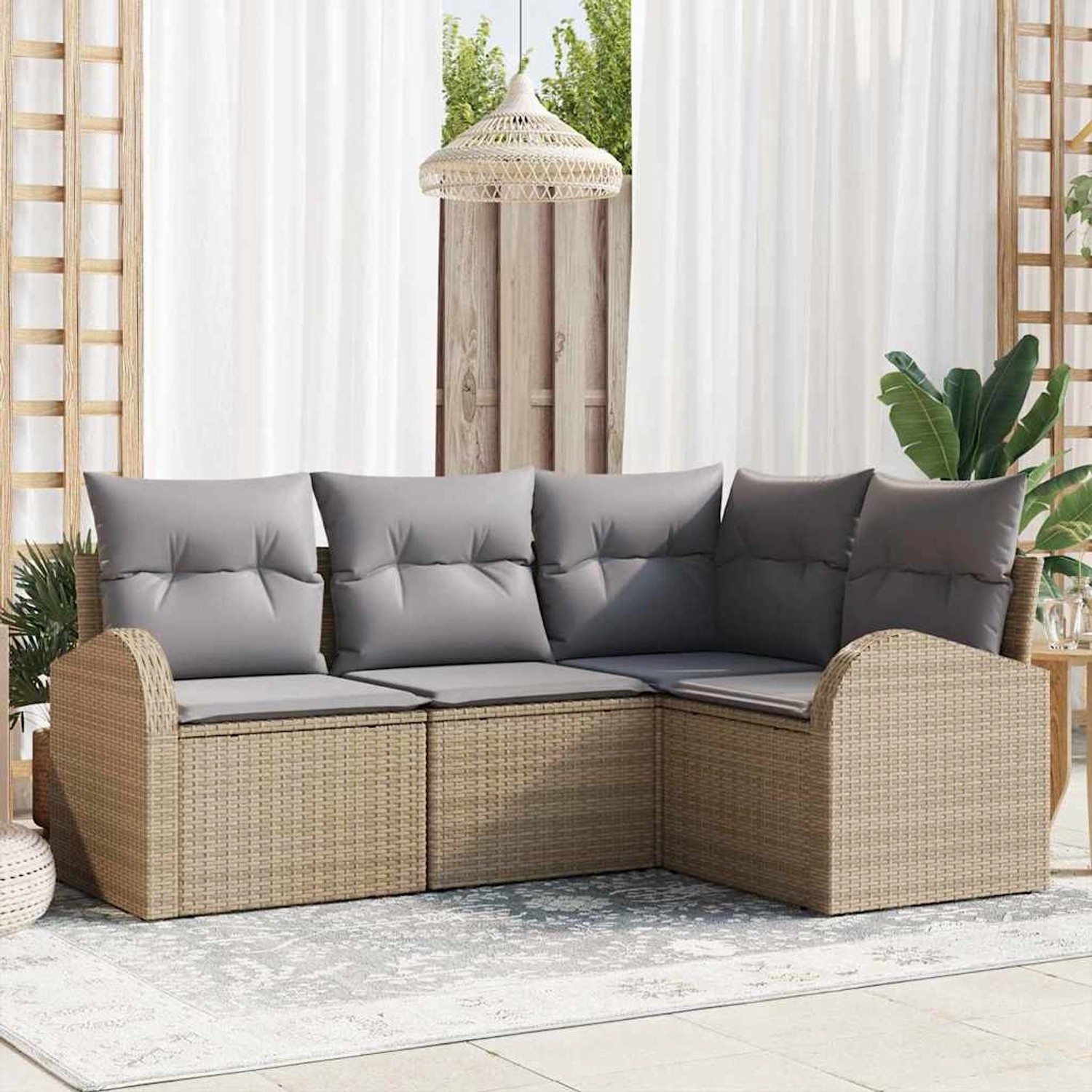 Beiges 4-teiliges Garten-Sofa-Set aus Poly Rattan mit grauen Kissen.