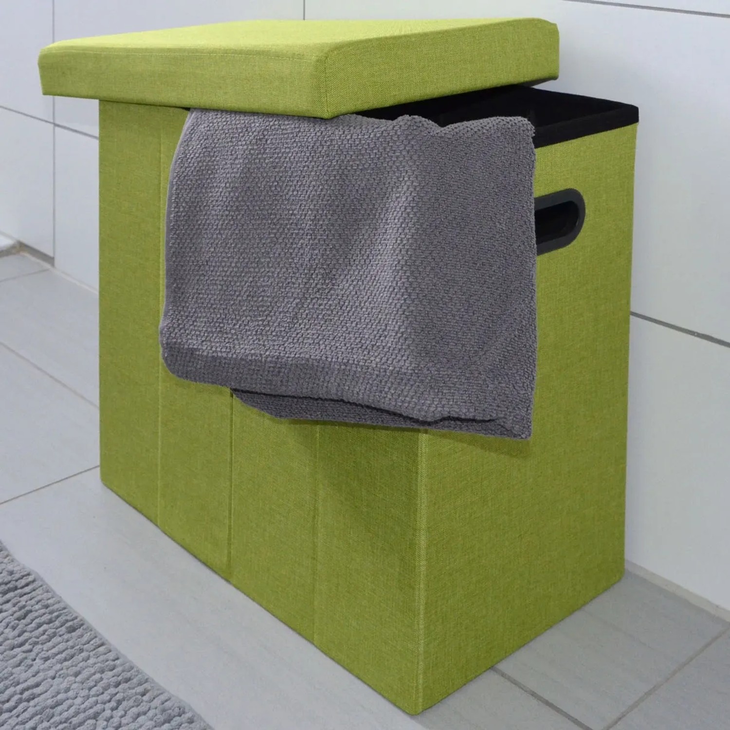 Grüner, faltbarer DuneDesign Wäschekorb (70L) in Leinen-Optik mit Deckel und Handtuch.