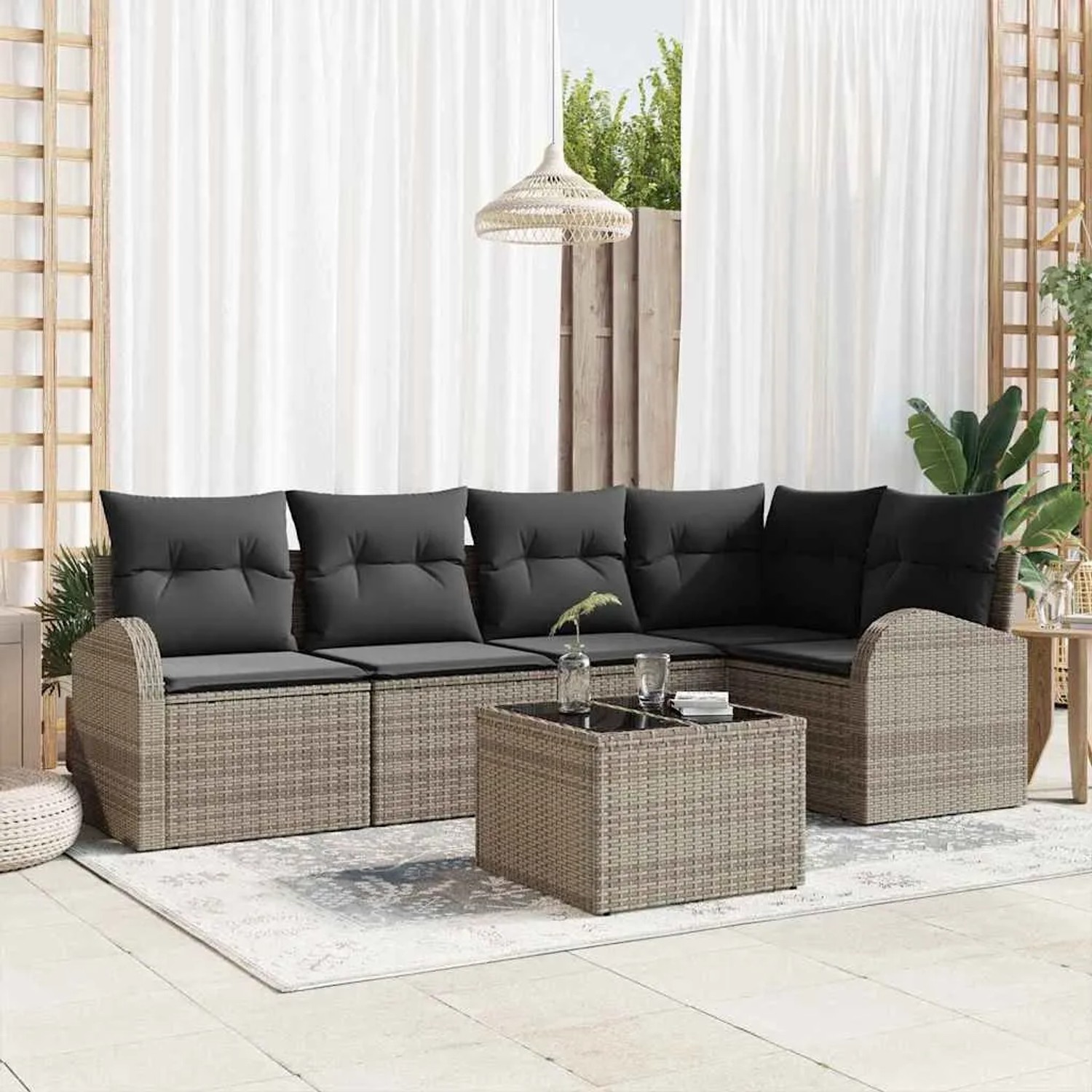 Graues 6-tlg. vidaXL Garten-Sofa-Set aus Poly Rattan mit Kissen und Tisch.