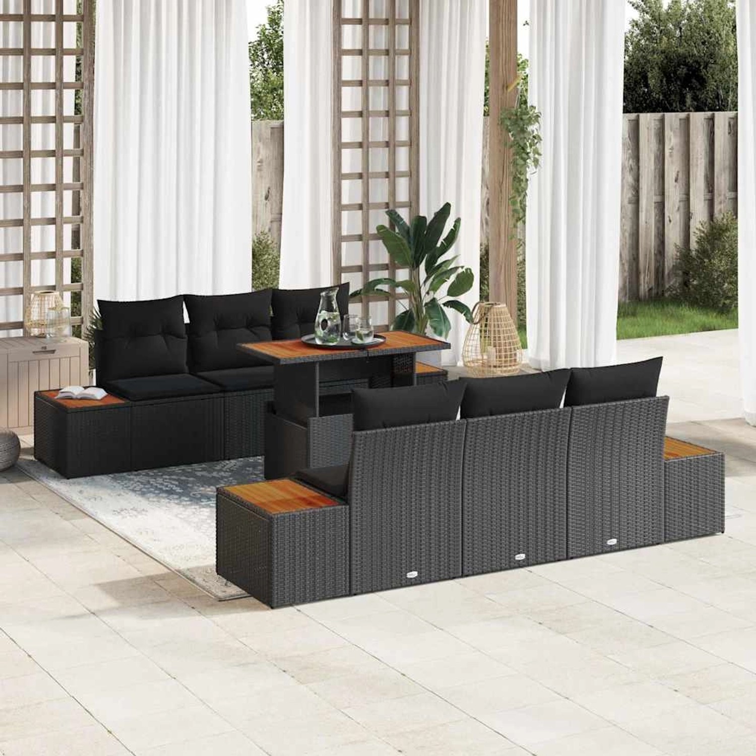 Schwarzes 7-teiliges Garten-Sofa-Set aus Poly Rattan mit Tisch und Stauraum.