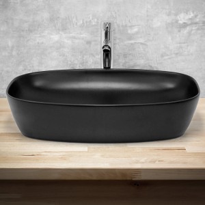 Schwarzes ML-Design Keramik Waschbecken mit abgerundeten Ecken auf Holzplatte.