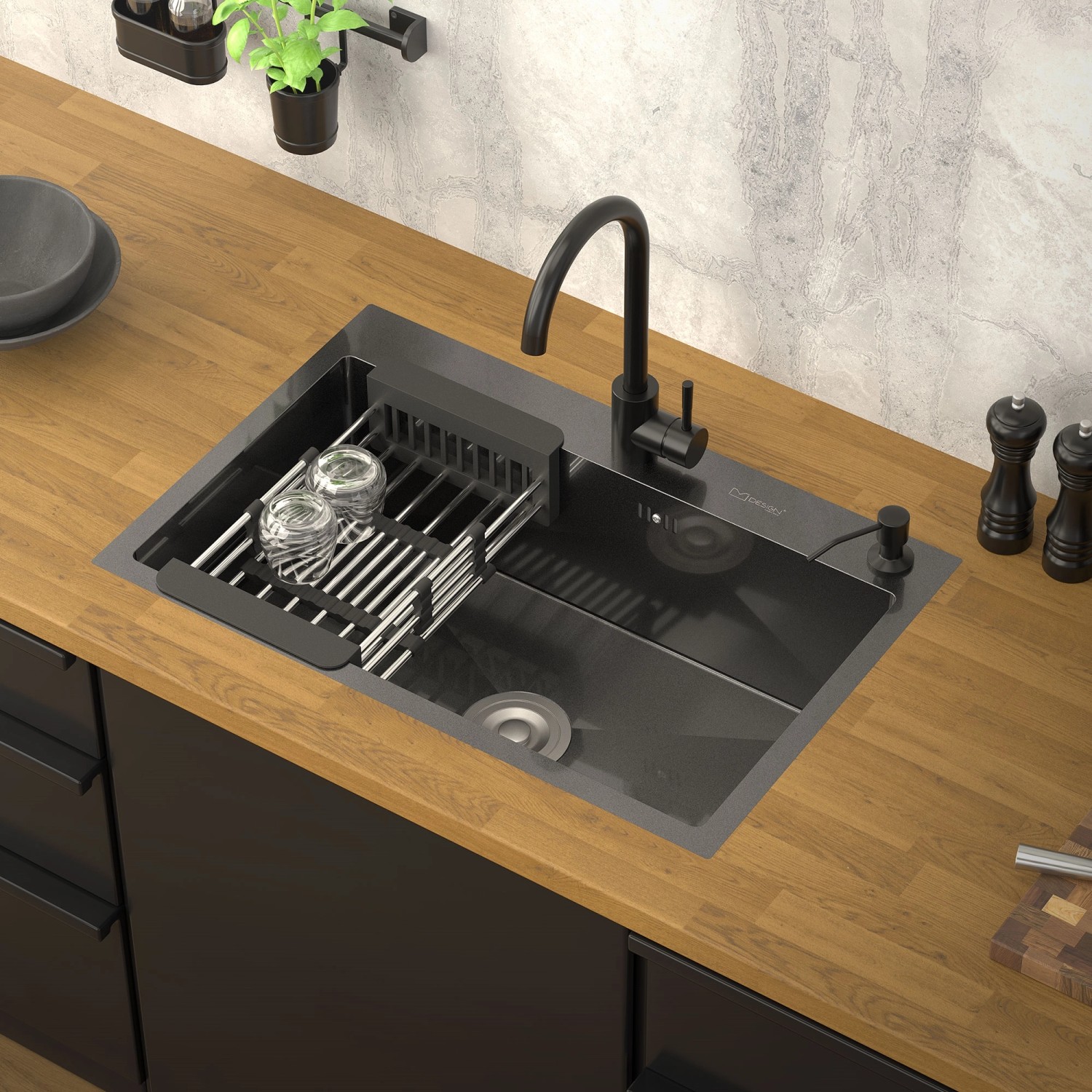 ML-Design Spülbecken, Edelstahl, anthrazit, mit Abtropfkorb und Siphon auf einer Küchentheke.