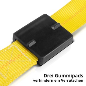 Schwarzes Gummipad auf gelbem STAHLWERK Radsicherungsgurt. Schützt Reifen und Felge, verhindert Verrutschen beim Autotransport.