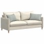 Zwei hellgraue Cordstoff Sofakissen 60x40 cm auf einem beigen Sofa, modern.