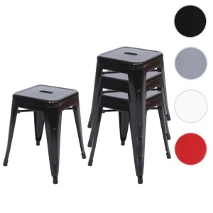 Vier schwarze Metallhocker, stapelbar, mit praktischer Trageöffnung. Robustes Design für Küche oder Werkstatt.