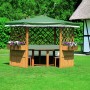 Pavillon Marburg mit Möbeln: Holzpavillon mit Tisch, Bänken und grünem Dach im Garten.