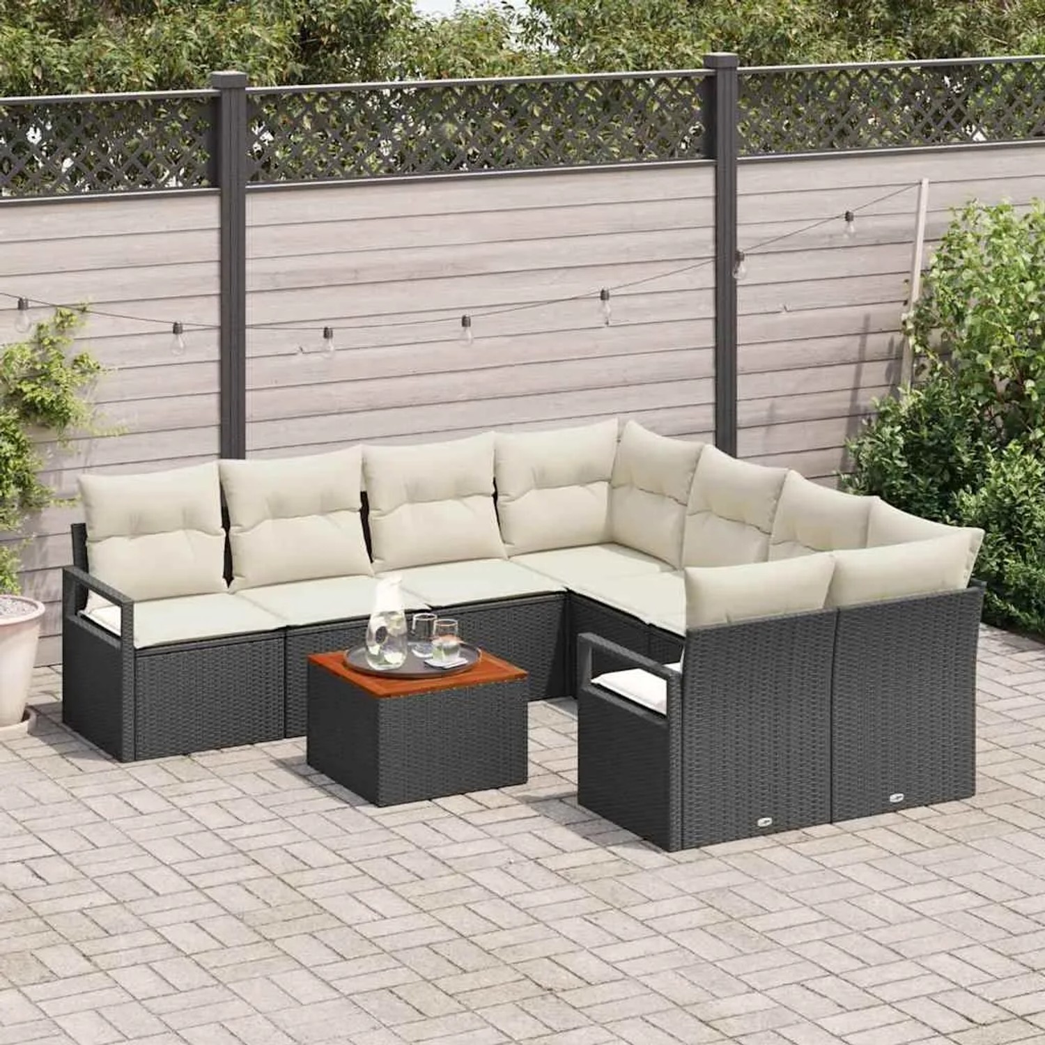 Schwarzes vidaXL Garten-Sofa-Set, 9-teilig, mit Tisch und cremefarbenen Polstern.