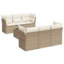 Beige 7-tlg. Garten-Sofagarnitur aus Rattan mit cremeweißen Kissen.