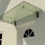 Modernes Glasvordach 200x90 cm mit Edelstahlhalterung über einer Haustür.