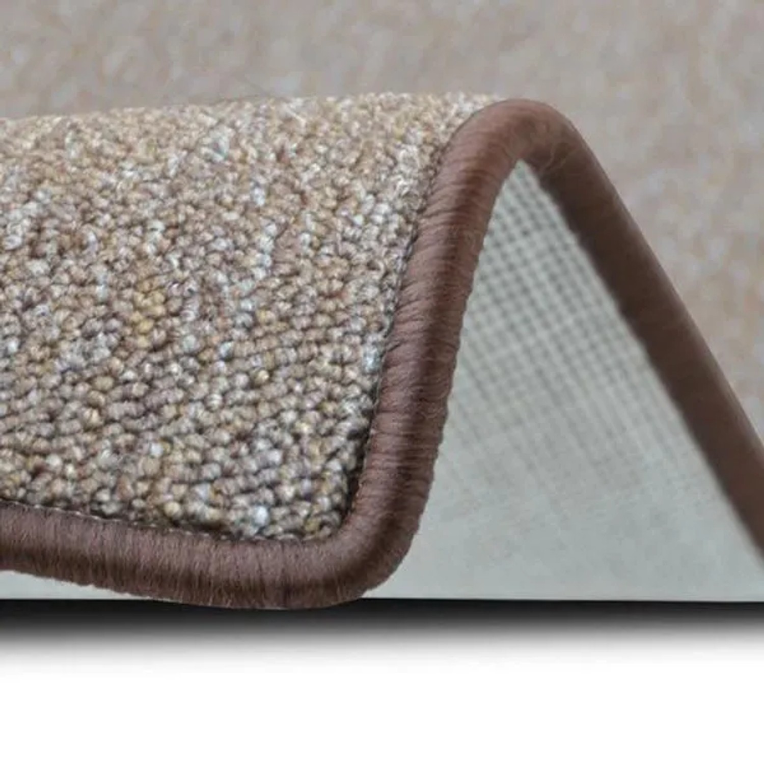 Detailansicht: Karat Teppich London, hellbrauner Schlingenflor mit farblich passender Umkettelung.