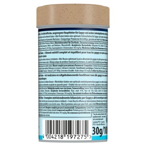 Rückseite der Tetra Guppy Color Mini Flakes Dose, 30g. Zylindrischer Behälter mit mehrsprachigem Etikett für Guppy Flockenfutter.