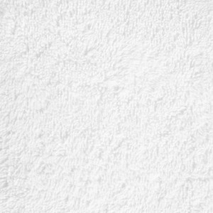 Detailaufnahme von weißen Premium-Badetüchern (10er-Set) aus Baumwolle, flauschige Textur.