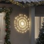 Warmweiße LED-Feuerwerk-Weihnachtsbeleuchtung als Stern an Hauswand, festliche Outdoor-Deko für Garten & Eingang.