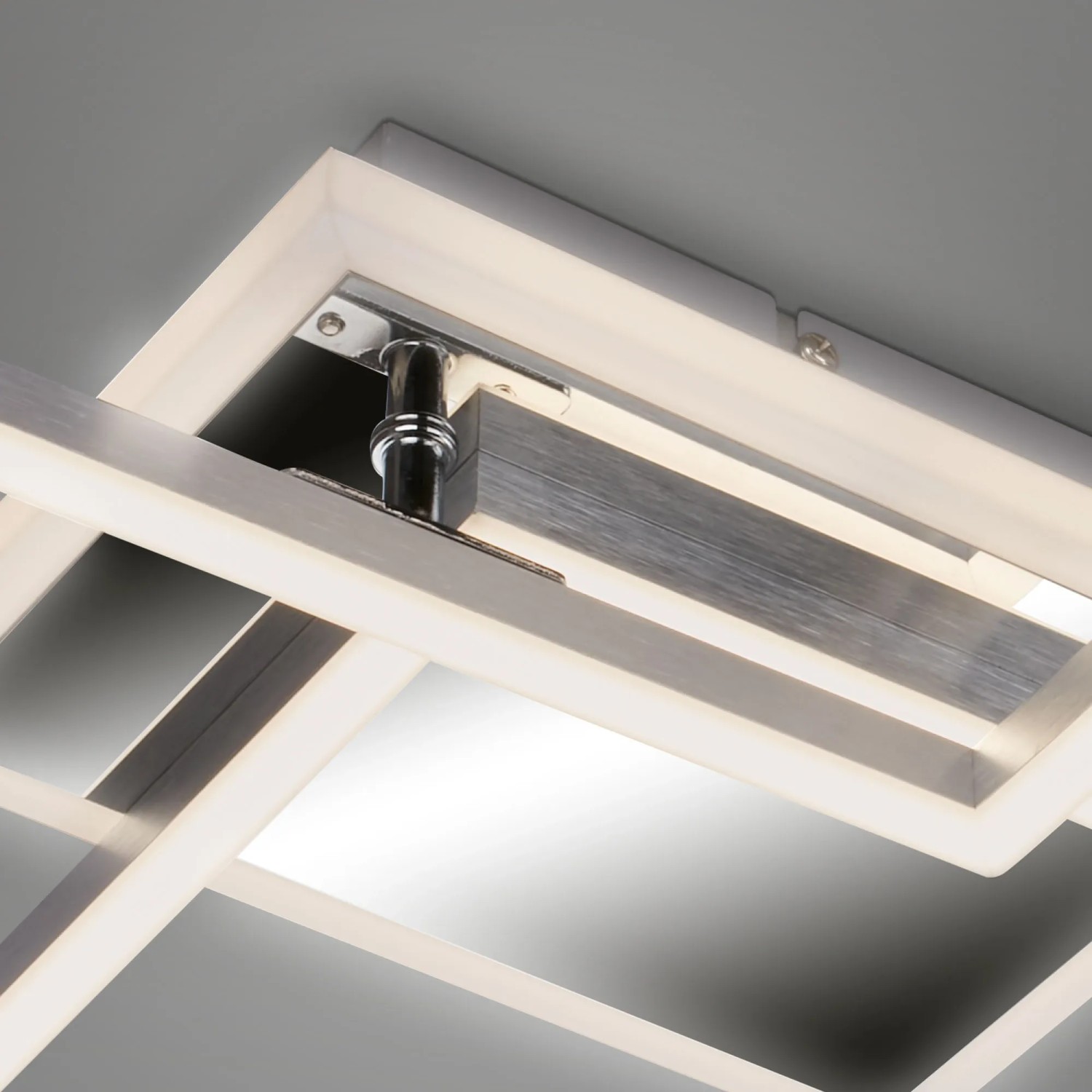 Dimmbare Brilo LED-Deckenleuchte Frame in Silber mit Backlight und Fernbedienung.