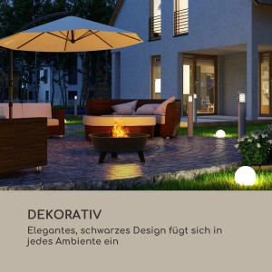 Blumfeldt Nolana 2-in-1 Feuerschale mit Grillrost im Garten bei Nacht.