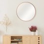 Runder DSK Design Wandspiegel Silver Coiffeur Ø 50 cm mit Kupferrahmen über Sideboard.