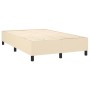 Cremefarbenes Boxspringbett 120x200 cm ohne Matratze und Kopfteil.