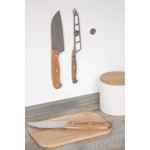 Fix-o-moll Topfmagnet mit Messern an einer weißen Wand, als Haushaltshelfer.