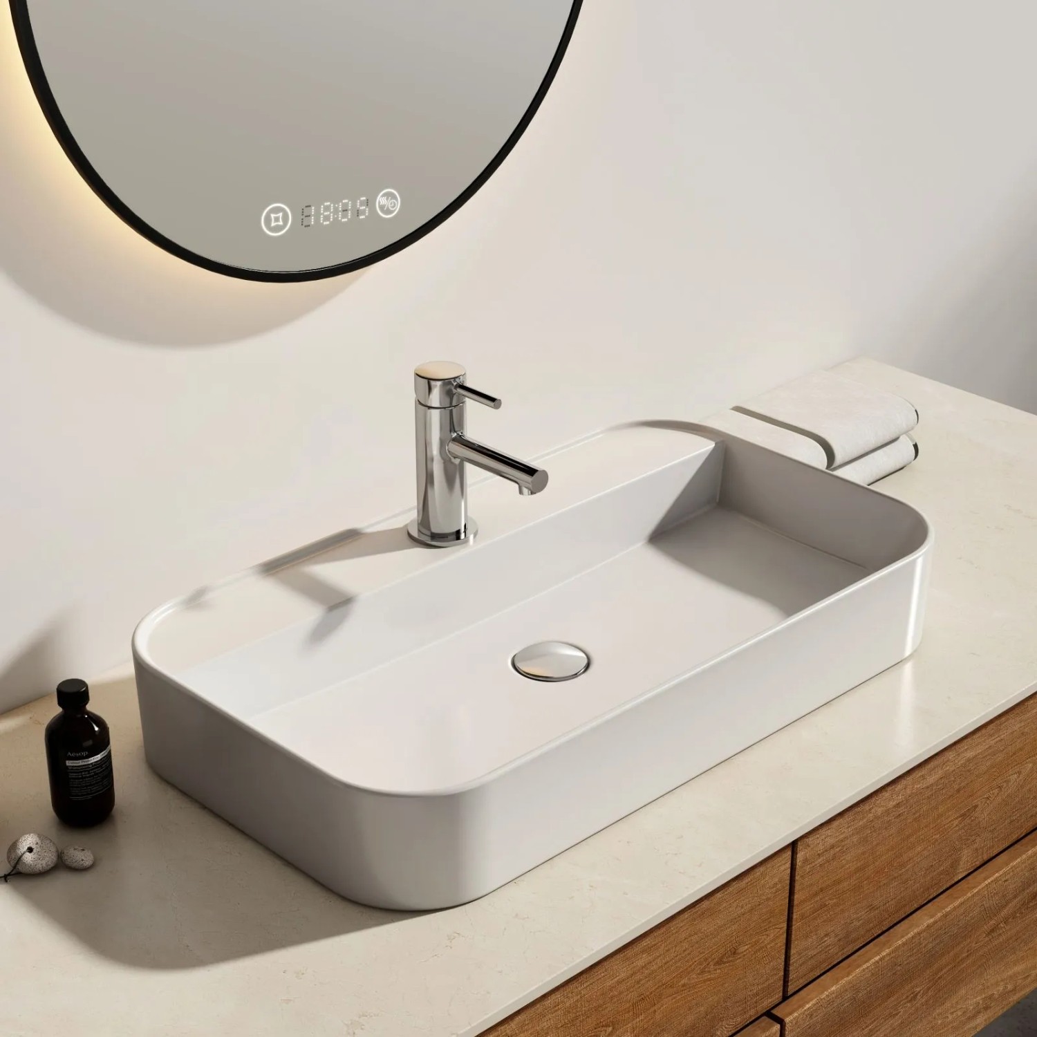 Modernes, eckiges Emke Handwaschbecken (70x40 cm) aus Keramik als Aufsatzwaschbecken mit Hahnloch.