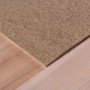 Beige, selbstklebende Andiamo Teppichfliese (40x40 cm) mit Rippenstruktur.