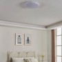 Weiße, runde Eglo LED-Deckenleuchte Expert Approdo (Ø 43 cm) im Schlafzimmer.
