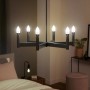 Philips Hue Filament Kerze E14 Doppelpack an einer Lampe im Retro-Look.