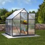 Graues Palram Canopia Gewächshaus, 3,4 m², mit Fundamentrahmen im Garten.