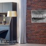 Könighaus Infrarotheizung mit Venedig-Motiv (50x90 cm) an Ziegelwand. Elektrische Heizung mit Panorama-Aussicht.