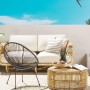 Schwarzer Beliani Cocktailsessel (90x70x87) aus Rattan, Teil einer Gartenmöbel-Szene.