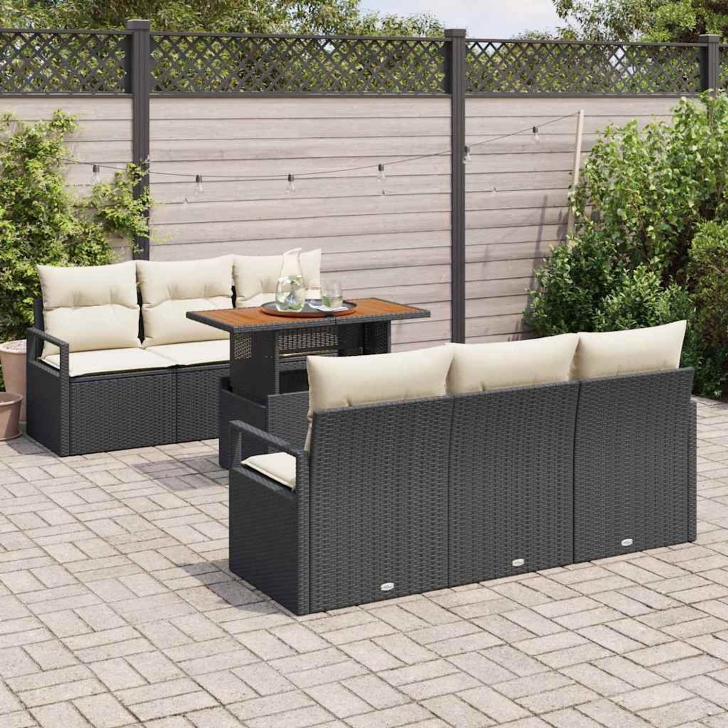 Schwarzes 7-tlg. vidaXL Garten-Sofa-Set aus Polyrattan mit Tisch und Stauraum.