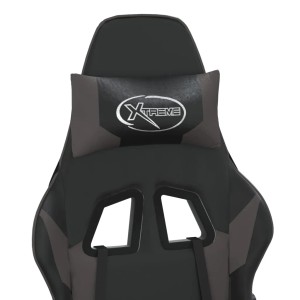 Detailansicht: Schwarzer/grauer Gaming-Stuhl mit Kopfstütze und Massagefunktion.