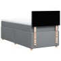 Hellgraues vidaXL Boxspringbett 90x200 cm mit Matratze und schwarzem Kopfteil.